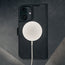 MagSafe charger connected to the Black Leather Case for iPhone 16