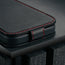 Magnetic closure clasp on the Black with Red Stitching Leather Flip Case for iPhone 17 Pro Max