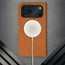 MagSafe charger attached to the Tan Leather Case for iPhone 17 Pro