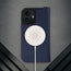 MagSafe charger attached to the Navy Blue Leather Case for iPhone 17